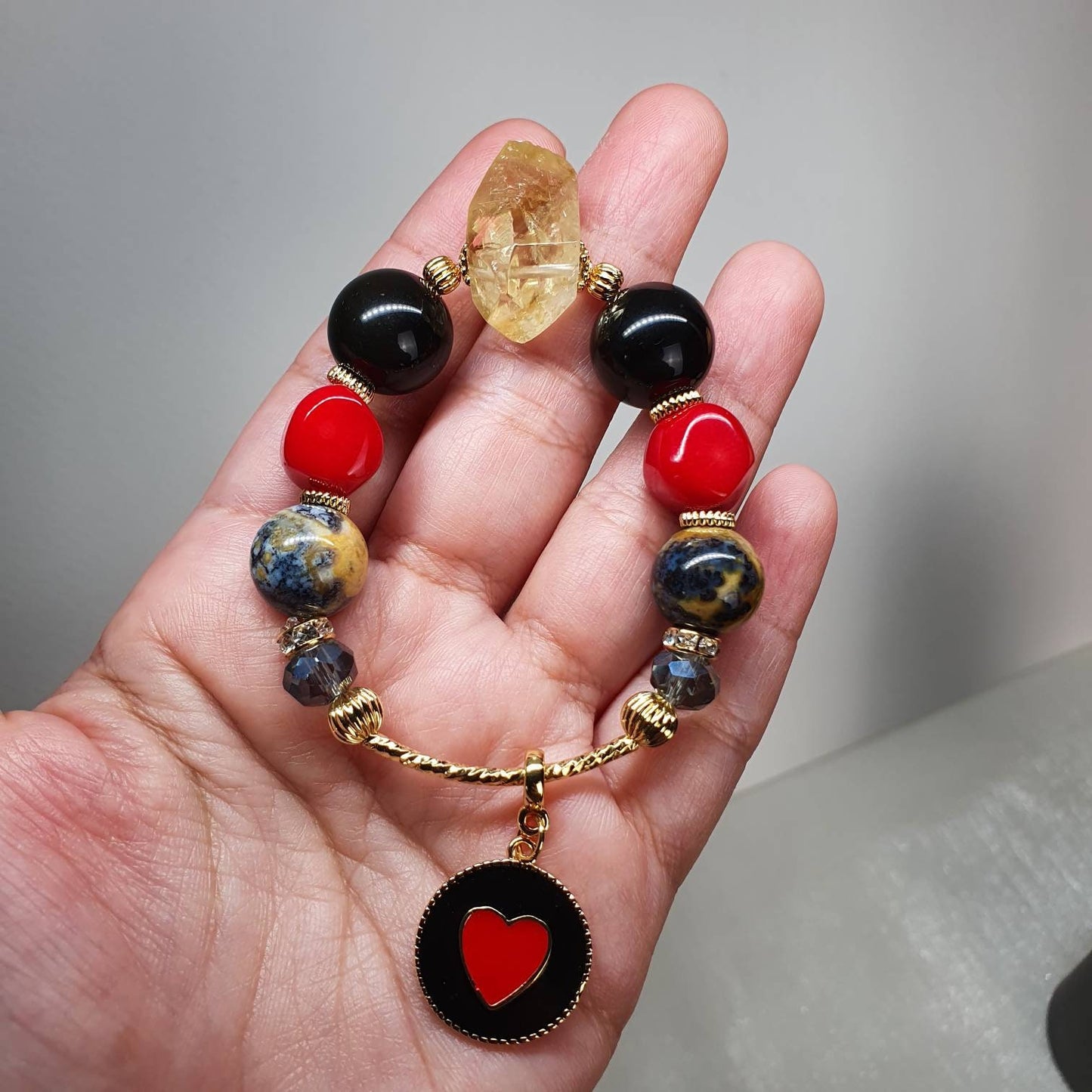 Handcrafted bracelet with Citrine, Rainbow Obsidian, Red Coral and Marine Agate