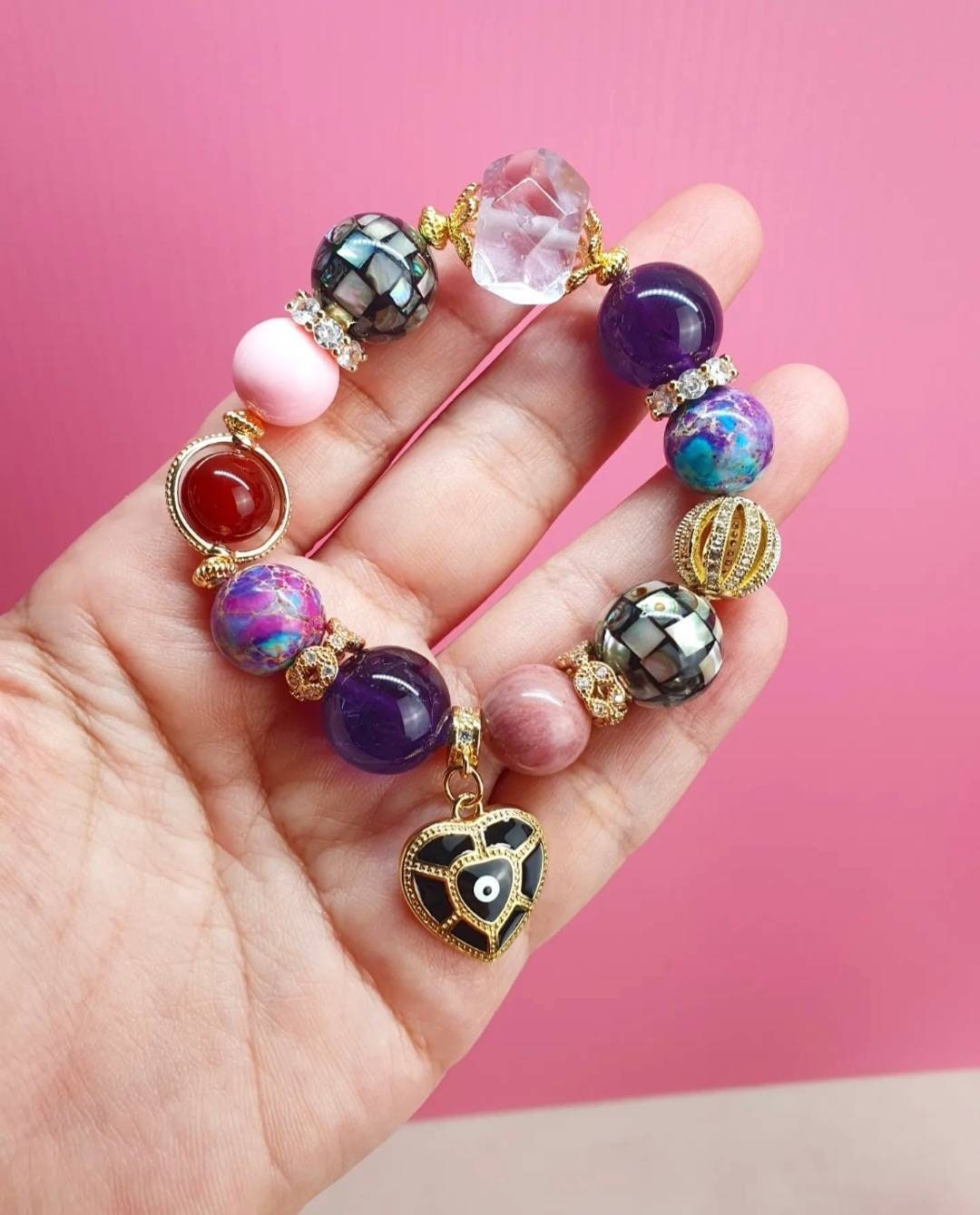 Handcrafted bracelet with Amethyst, Carnelian, Queen Conch, Imperial Jasper, Abalone Mosaic bead and Rhodonite