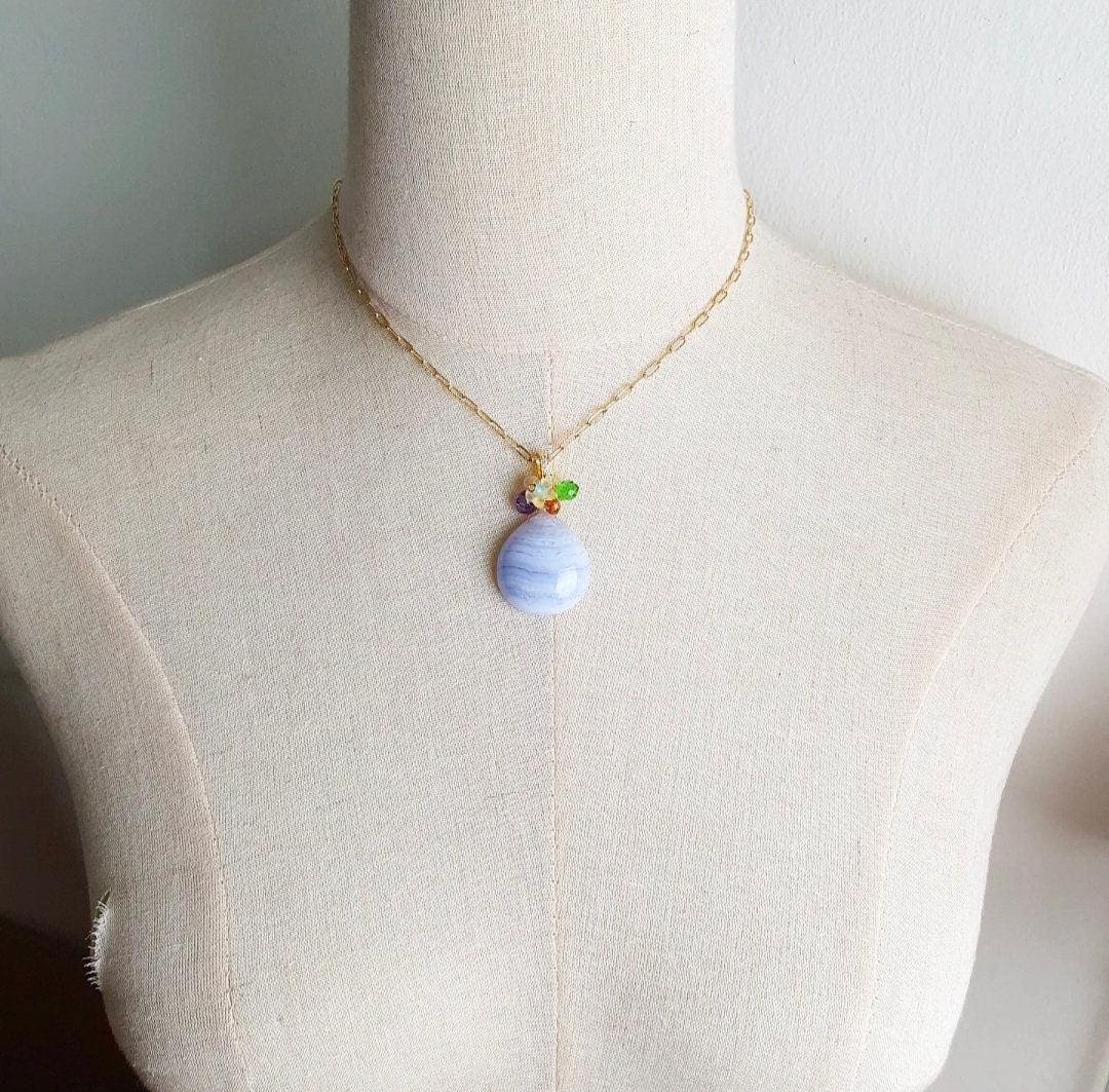 Handcrafted necklace with a beautiful pendant consist of Blue Lace Agate, Shell beads, Zirconia beads and Glass beads