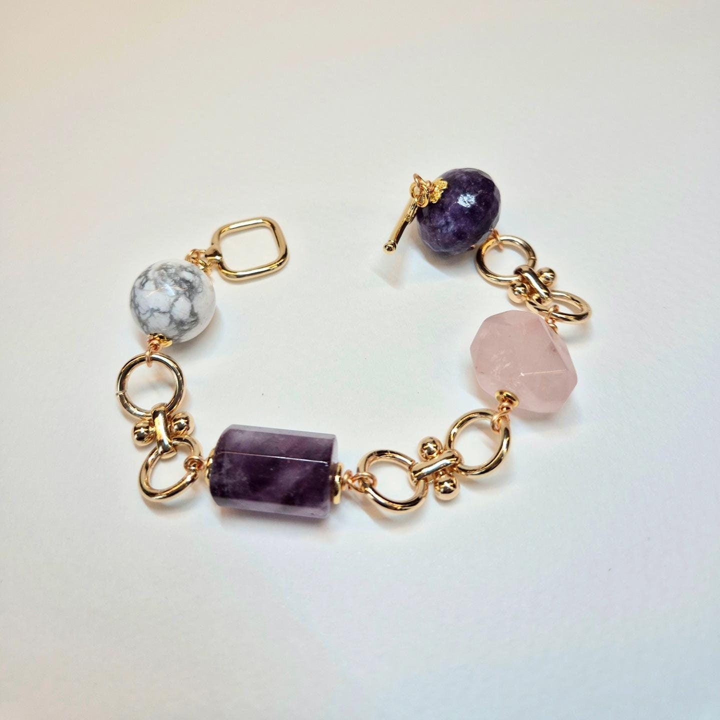 Handcrafted bracelet with Amethyst, Rose Quartz, Lepidolite and Howlite to assist in alleviating anxiety