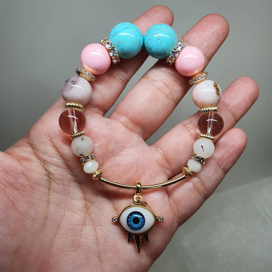 Handcrafted bracelet with Blue Turquoise, Queen Conch, Pink Opal, Clear Quartz and Black Dot White Jade