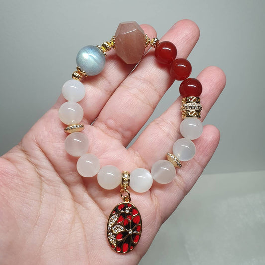 Handcrafted bracelet with Sunstone, Grey Moonstone,  Milky Moonstone and Carnelian