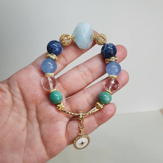 Handcrafted bracelet with Aquamarine, Sodalite, Blue Jade, Faceted Clear Quartz and Green Pine Agate