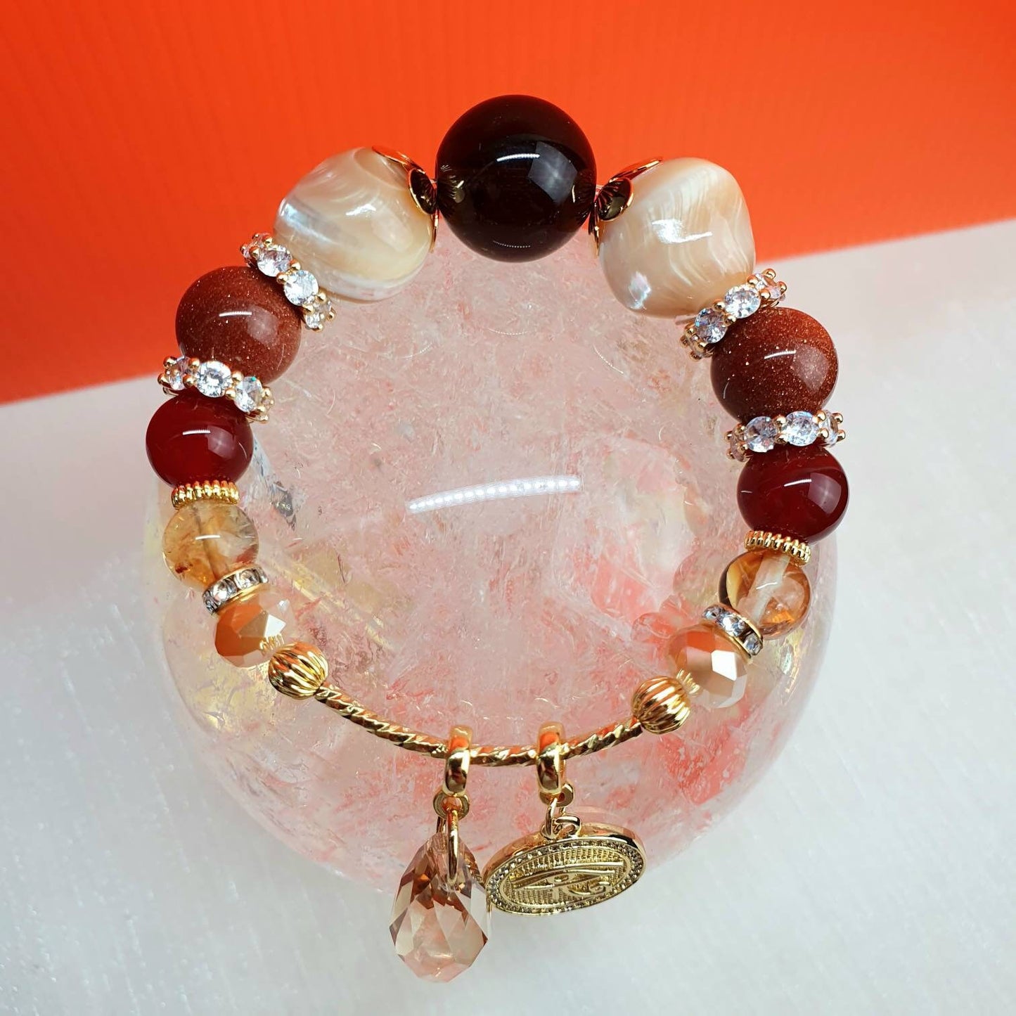 Handcrafted bracelet with Premium Quality Smoky Quartz (16mm), Mother of Pearl, Golden Sandstone, Carnelian (10mm) and Citrine