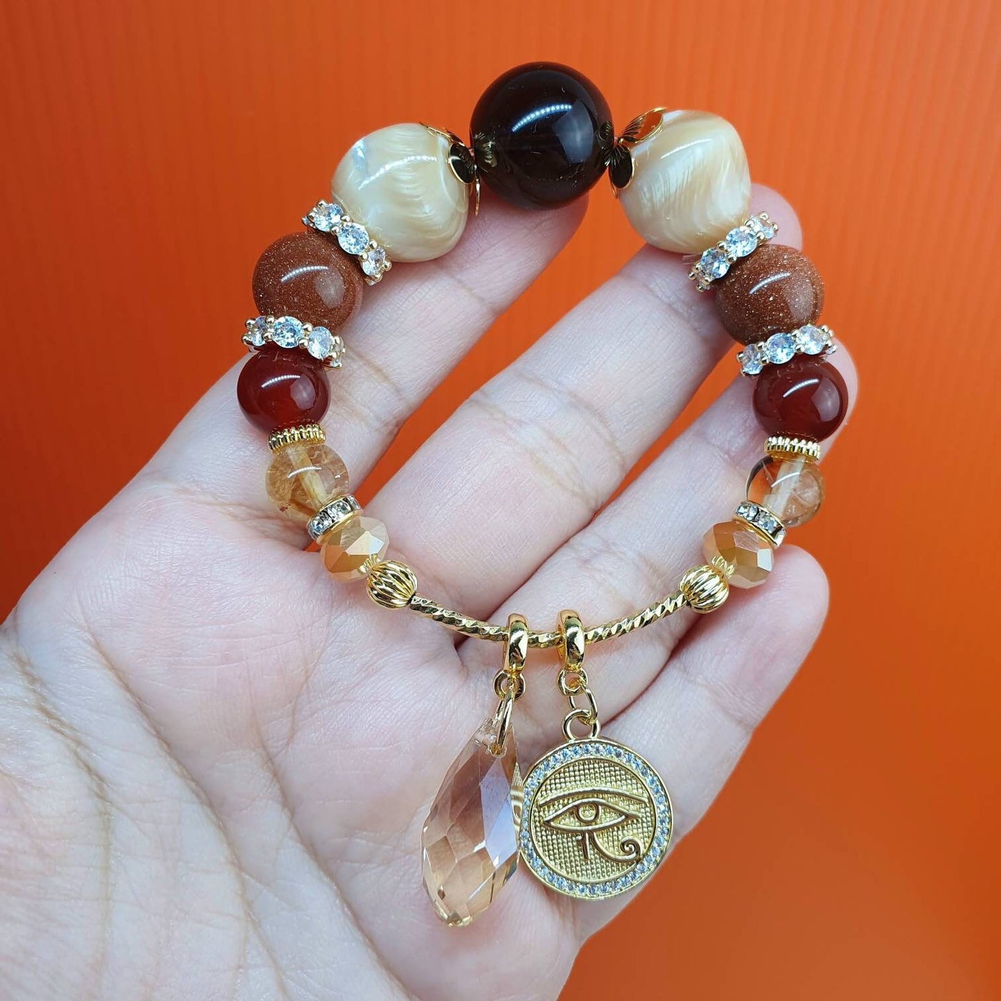 Handcrafted bracelet with Premium Quality Smoky Quartz (16mm), Mother of Pearl, Golden Sandstone, Carnelian (10mm) and Citrine