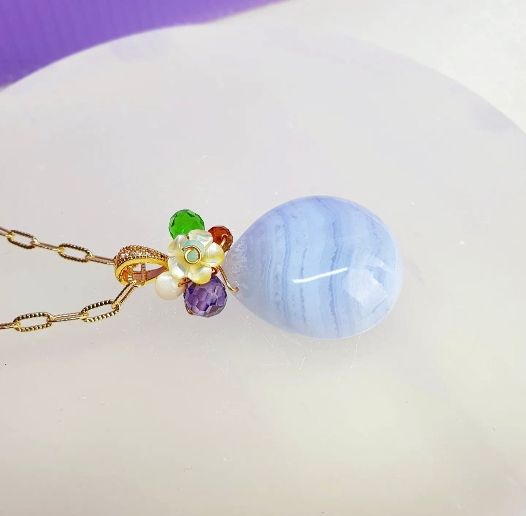 Handcrafted necklace with a beautiful pendant consist of Blue Lace Agate, Shell beads, Zirconia beads and Glass beads