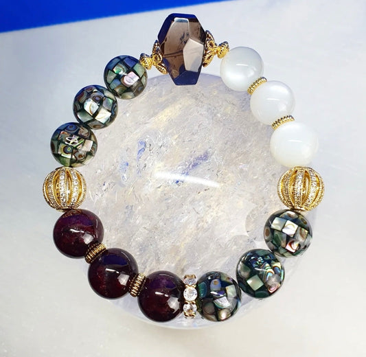 Handcrafted bracelet with Smoky Quartz, Moonstone, Red Garnet and Abalone Mosaic Shell bead