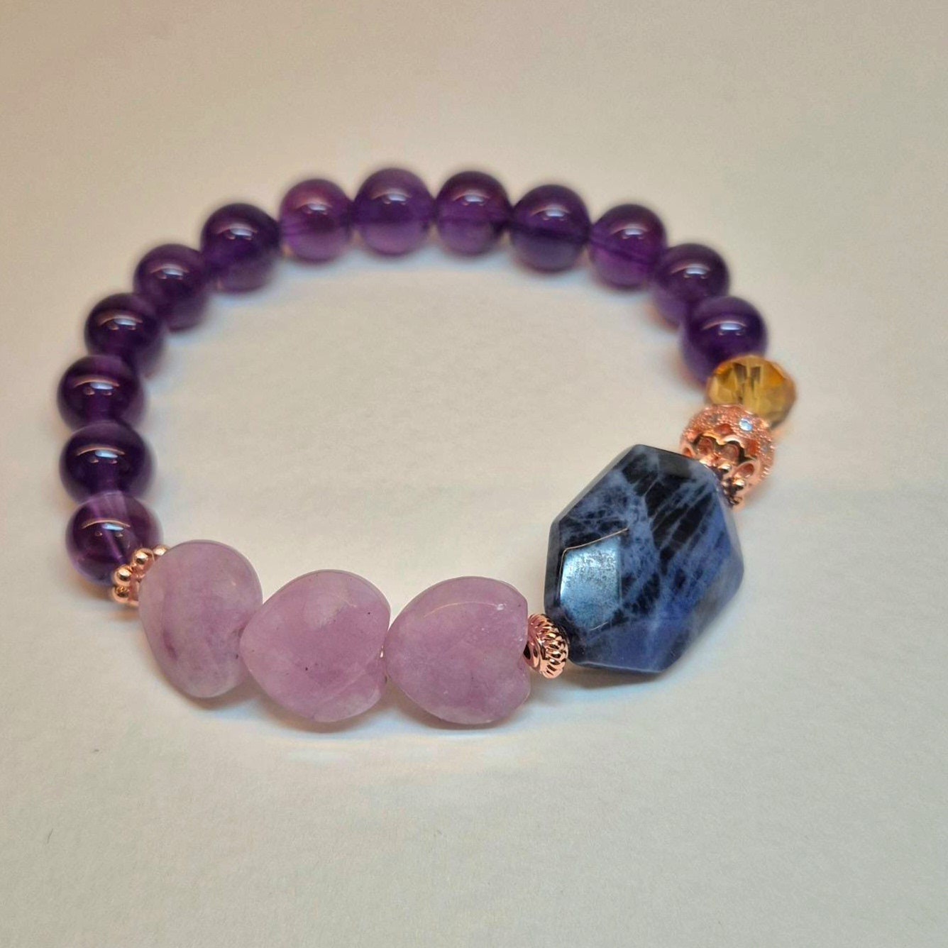 Handcrafted bracelet with Amethyst (8mm), heart shaped Lepidolite and Blue Sodalite to assist a better sleep