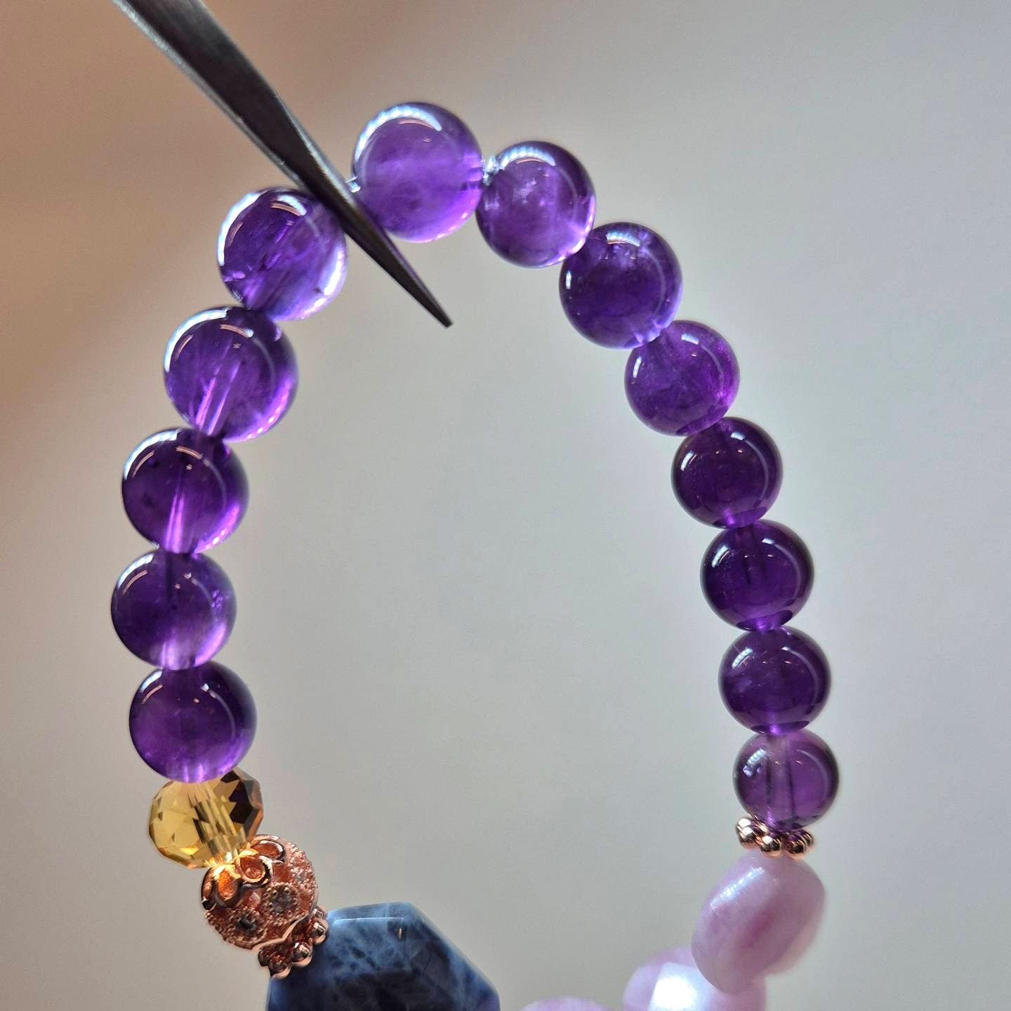 Handcrafted bracelet with Amethyst (8mm), heart shaped Lepidolite and Blue Sodalite to assist a better sleep